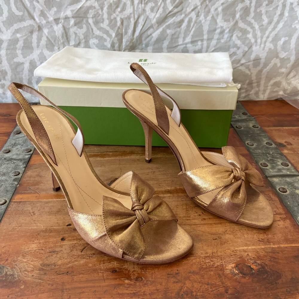 Kate Spade bronze liquid suede sandal heals with bow.